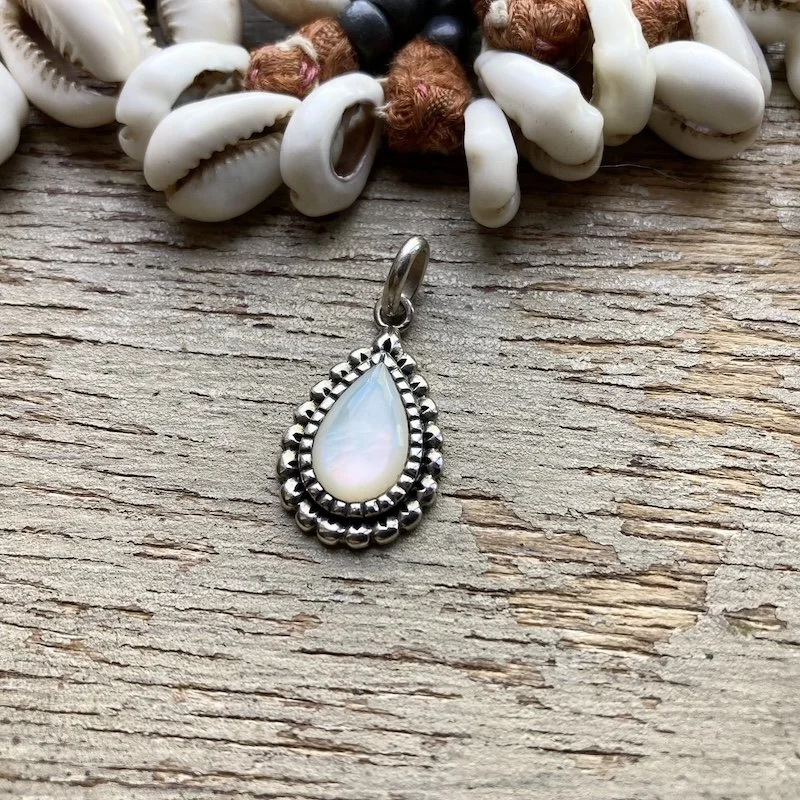 ornate sterling silver and mother of pearl pendant 1.jpeg