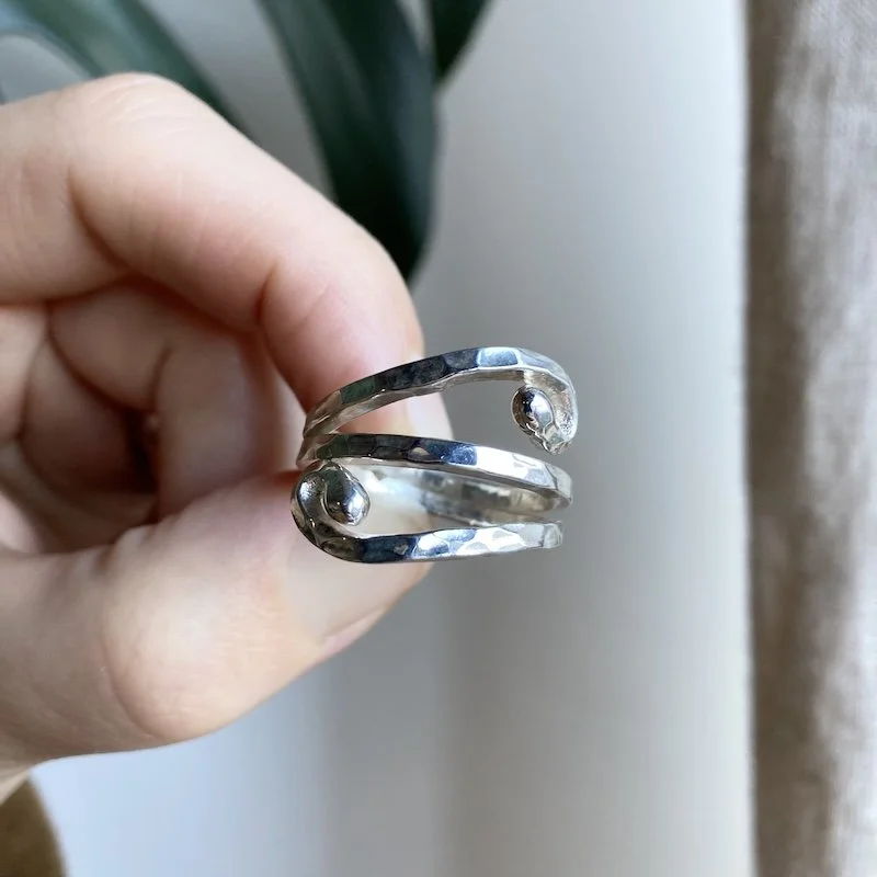 hammered solid silver ring.jpeg