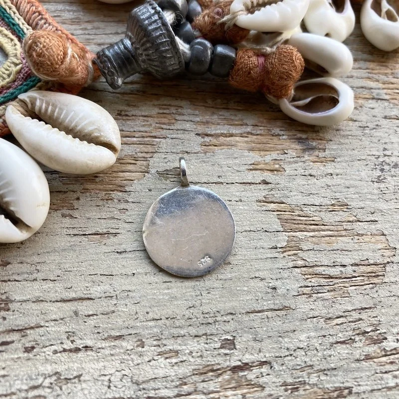 cute little sterling silver embossed pendant 2.jpeg