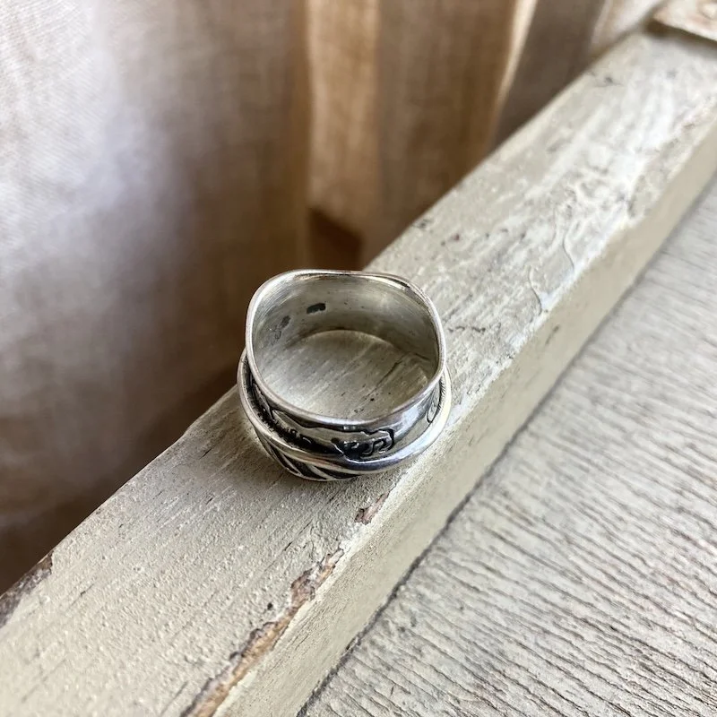 sterling silver earthy spinner ring 3.jpeg