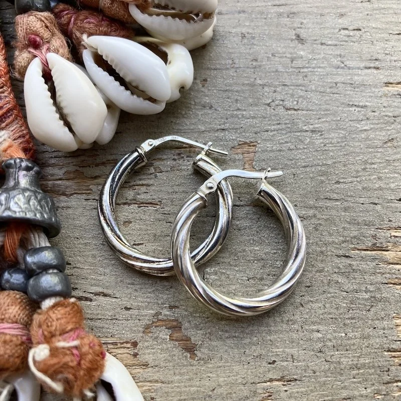 vintage sterling silver twist hoops 1.jpeg