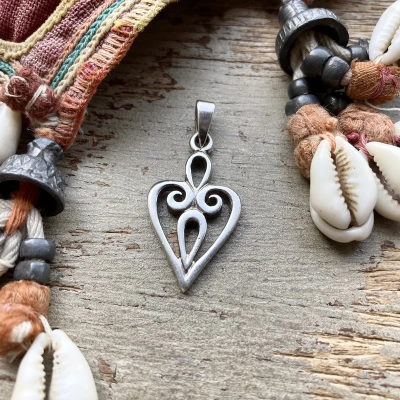 vintage ornate sterling silver heart pendant 1.jpeg