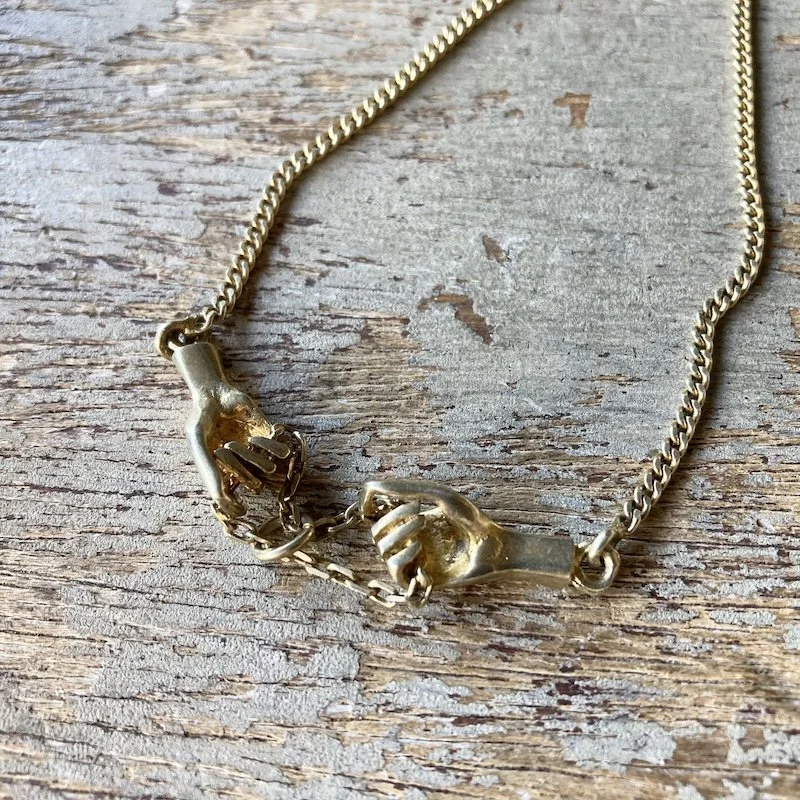 vintage sterling silver gilt hands necklace 6.jpeg