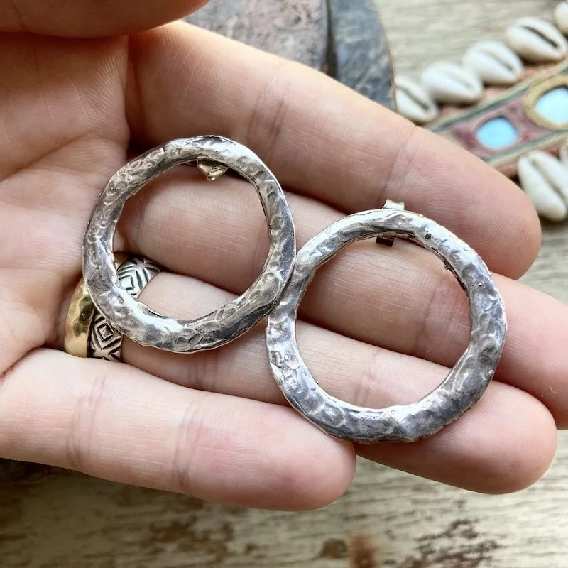 minimalist solid silver hammered circle earrings 3.jpeg