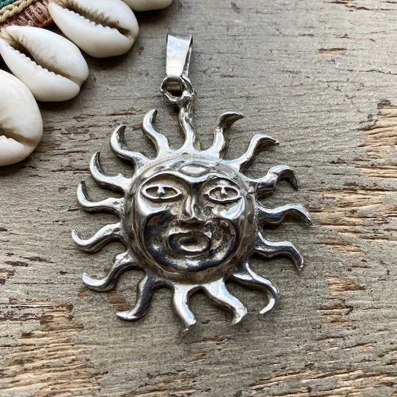 vintage solid silver celestial sun pendant 1.jpeg