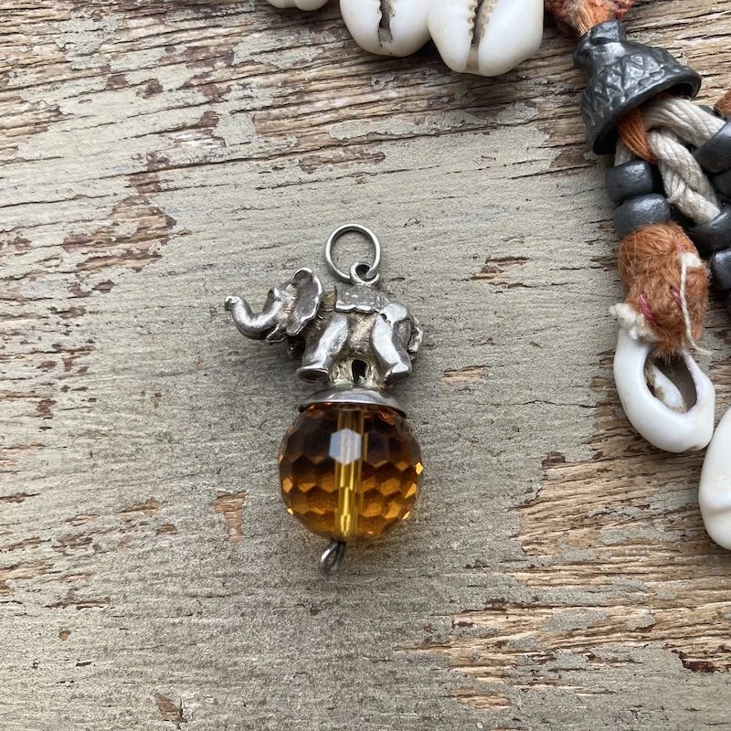 vintage sterling silver elephant on a ball pendant 2.jpeg