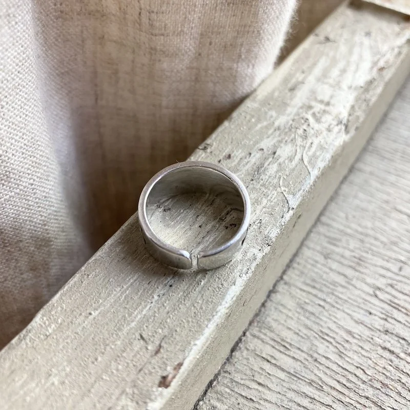 solid silver geometric patterned pinky : toe ring 2.jpeg