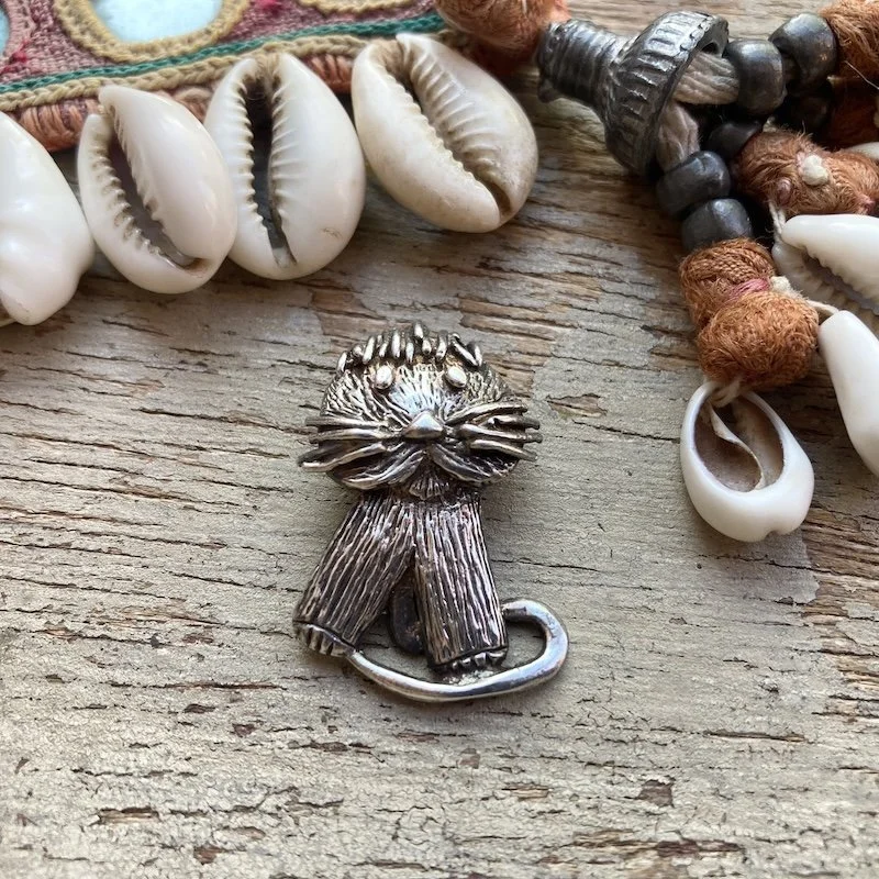 characterful vintage sterling silver cat pendant 1.jpeg