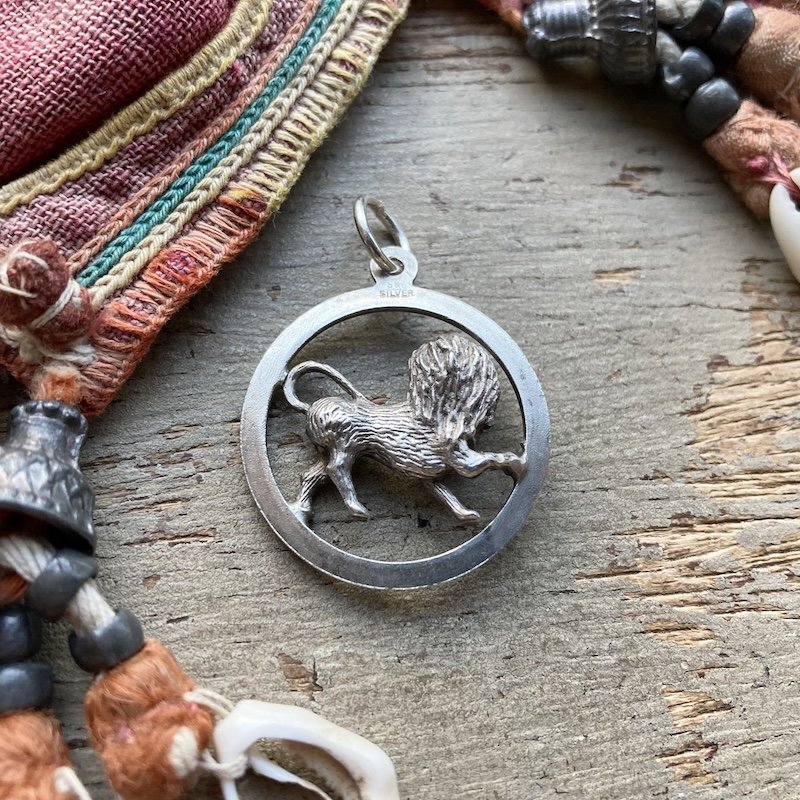 vintage sterling silver lion pendant 2.jpeg