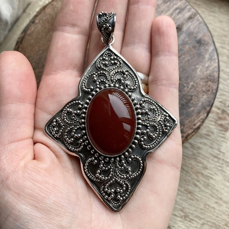 large Balinese ornate sterling silver and carnelian pendant 3.jpeg
