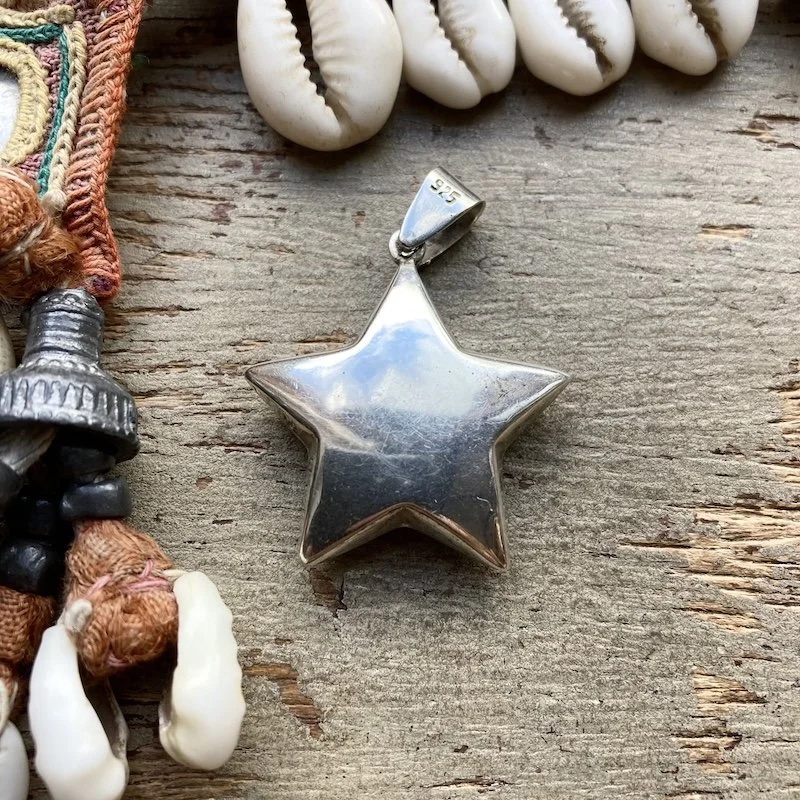 vintage sterling silver puffy star pendant 2.jpeg