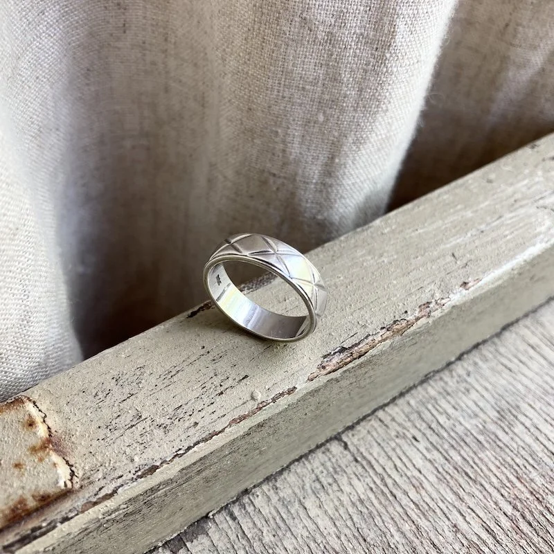 engraved solid silver band ring 1.jpeg