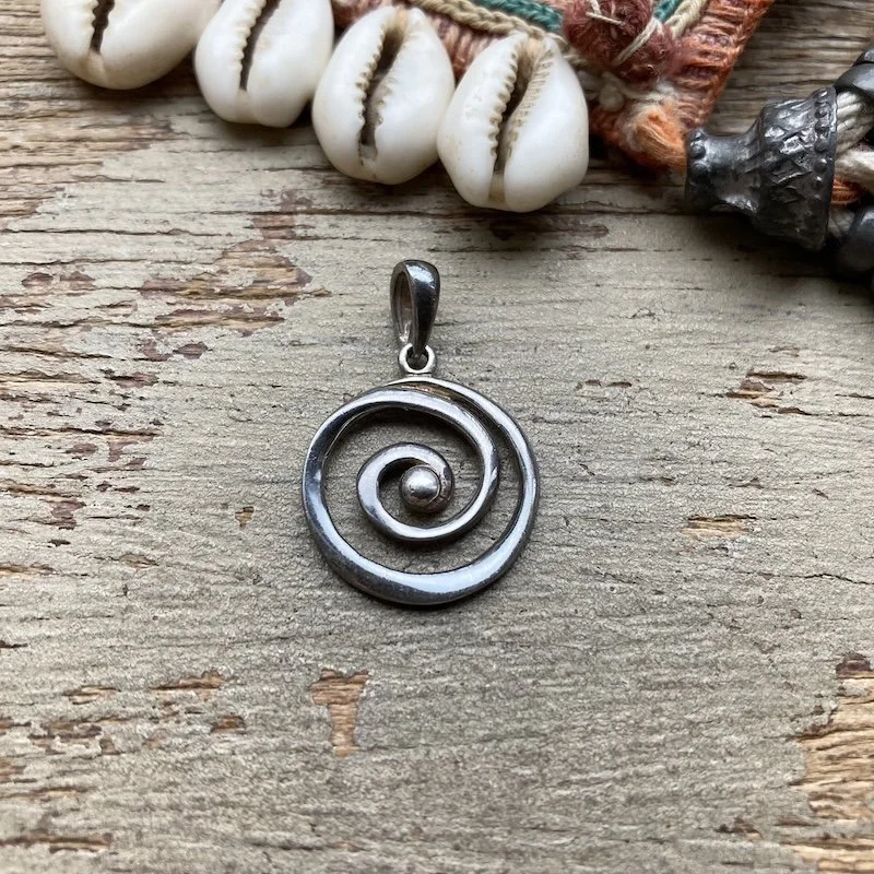 vintage sterling silver spiral pendant.jpeg