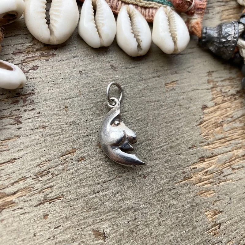 whimsical solid silver moon pendant.jpeg