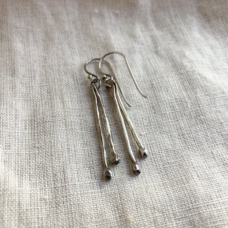 hammered solid silver dangly earrings 1.jpeg