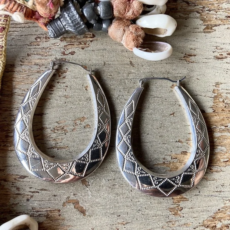 sterling silver ornately patterned Creole hoops 1.jpeg