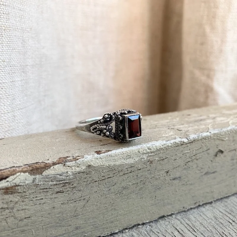 ornate sterling silver and garnet ring 3.jpeg