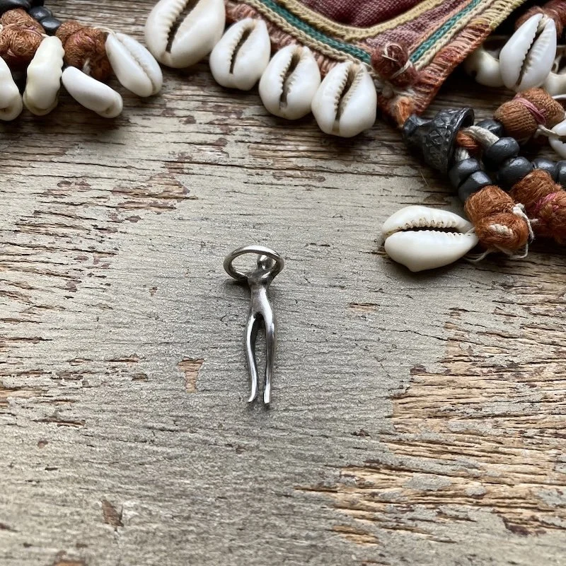 sterling silver figure pendant.jpeg