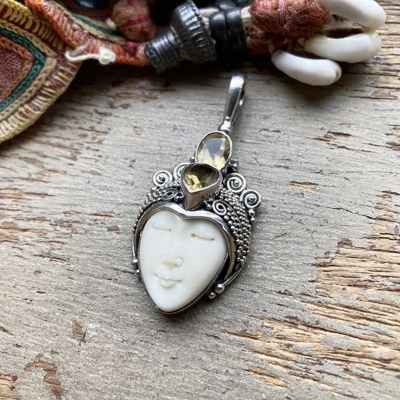 small sterling silver and citrine Balinese goddess pendant 1.jpeg