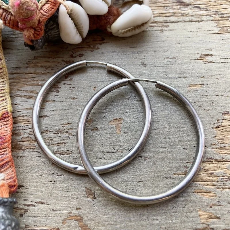 simple sterling silver hoops 1.jpeg