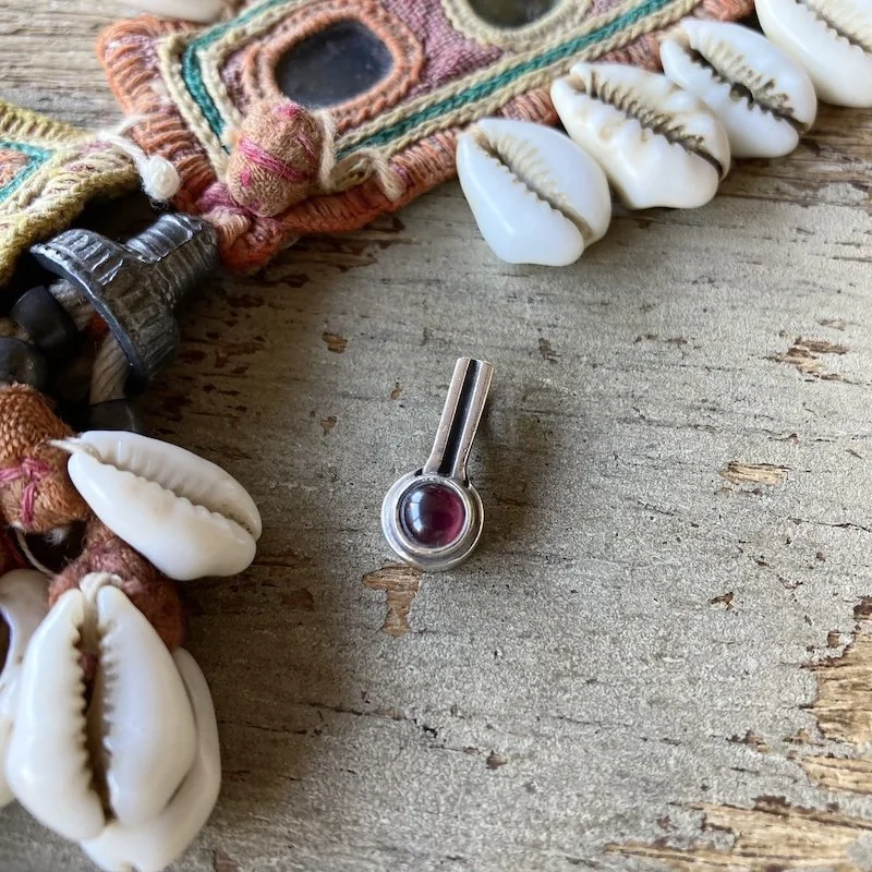 simple sterling silver and garnet pendant 1.jpeg