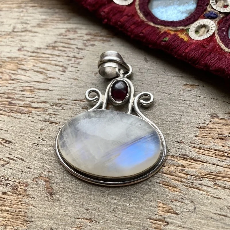 sterling silver rainbow moonstone and garnet pendant 2.jpeg