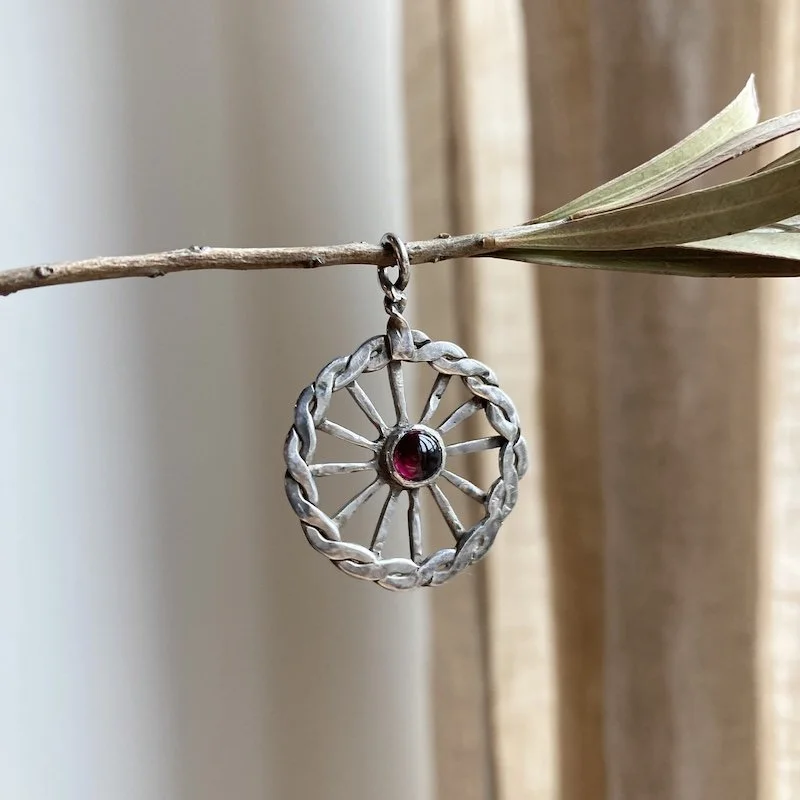 Pretty Vintage Sterling Silver Garnet Wheel Pendant
