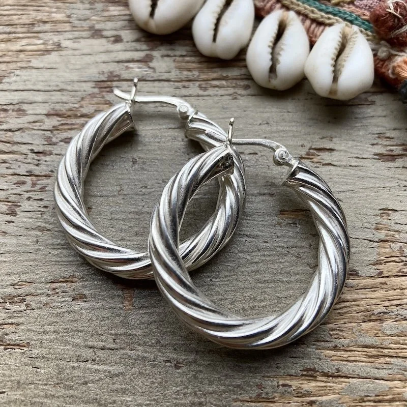vintage sterling silver twist hoops 2.jpeg