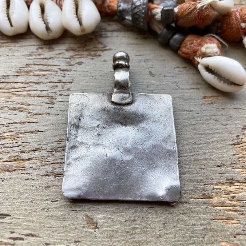 vintage Indian solid silver deity pendant 2.jpeg