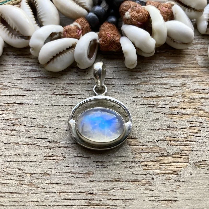 sterling silver flashy rainbow moonstone pendant 1.jpeg