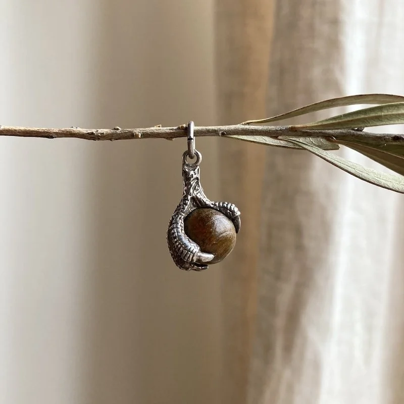 vintage sterling silver wooden claw and orb pendant 6.jpeg