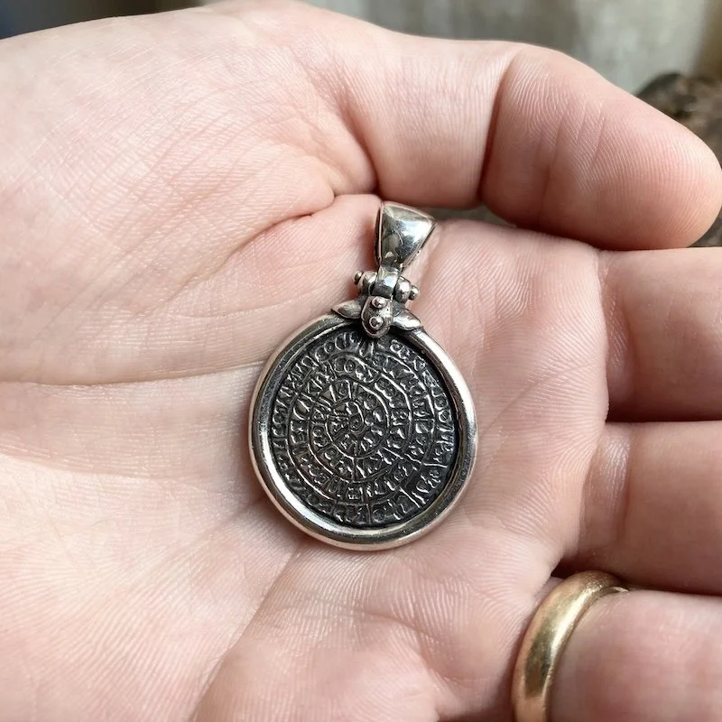 heavy vintage solid silver Phaistos disc pendant 1.jpeg