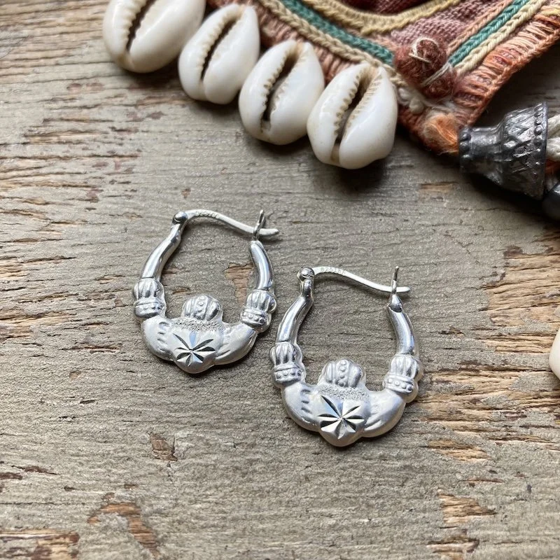 sterling silver Claddagh hoops.jpeg