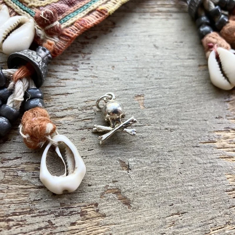 vintage sterling silver skull and crossbones pendant 2.jpeg