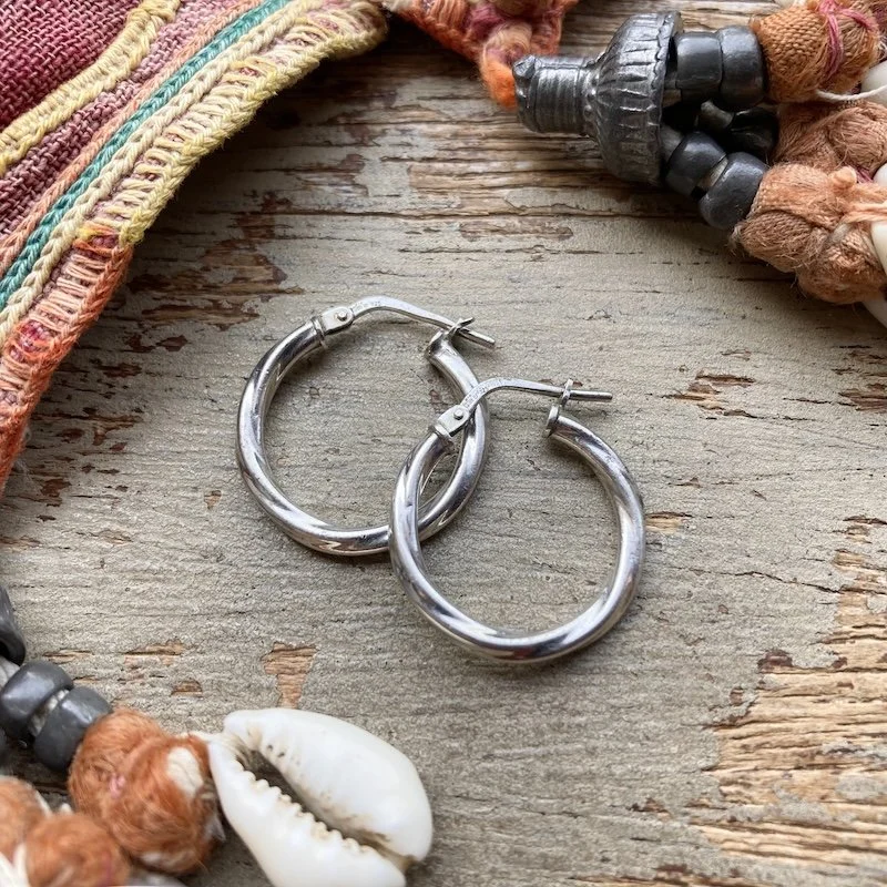 cute little sterling silver textured hoops 1.jpeg