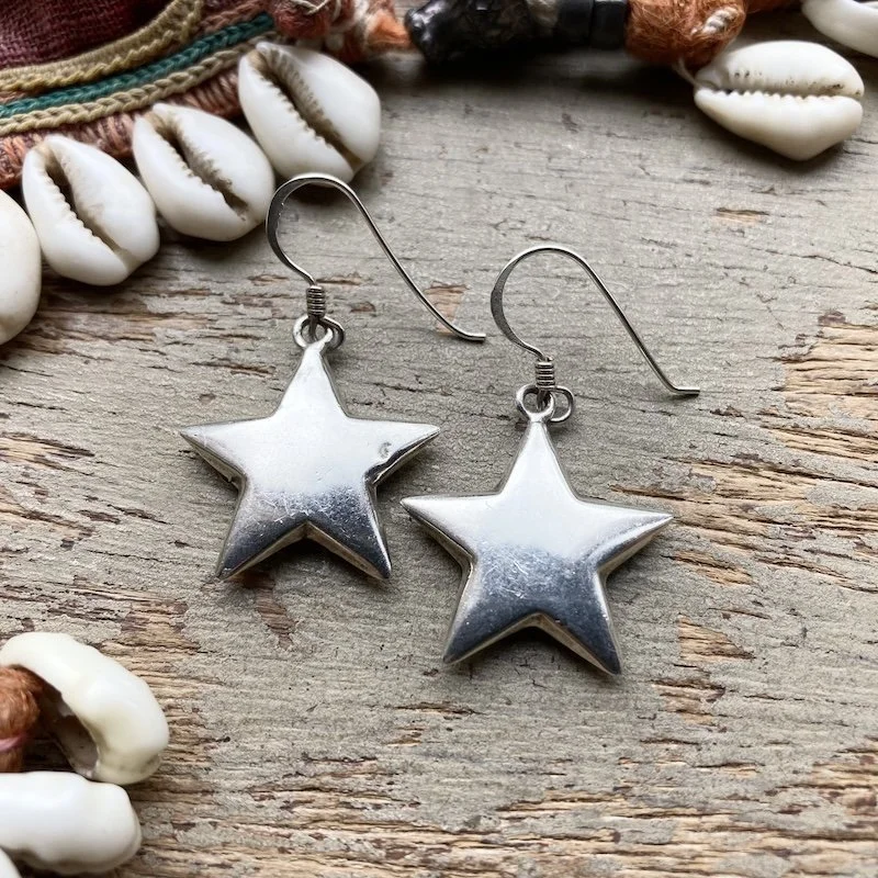 vintage sterling silver puffy star earrings 1.jpeg