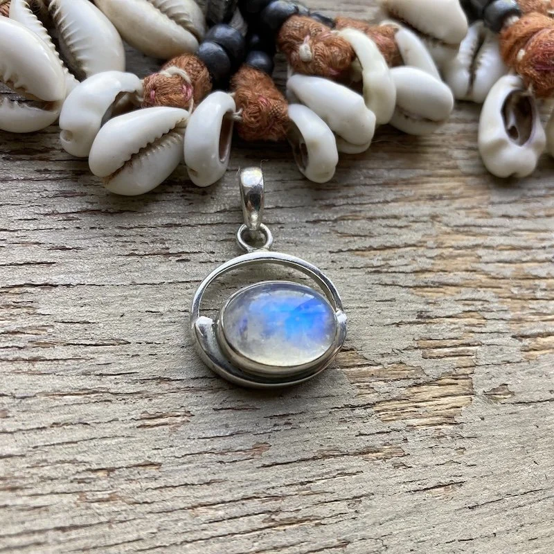 sterling silver flashy rainbow moonstone pendant 2.jpeg