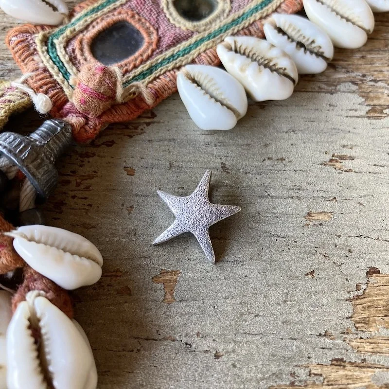 funky solid silver textured star pendant 1.jpeg