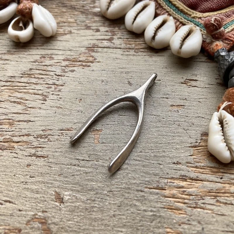 vintage sterling silver wishbone pendant.jpeg