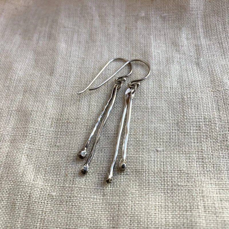 hammered solid silver dangly earrings 3.jpeg