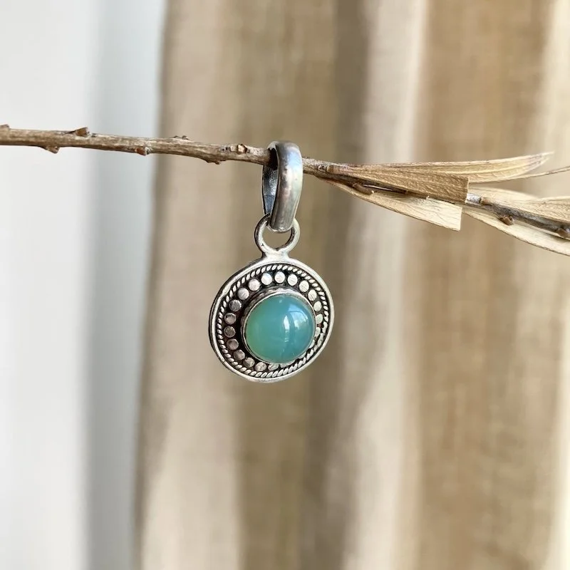 ornate sterling silver and chalcedony pendant 1.jpeg