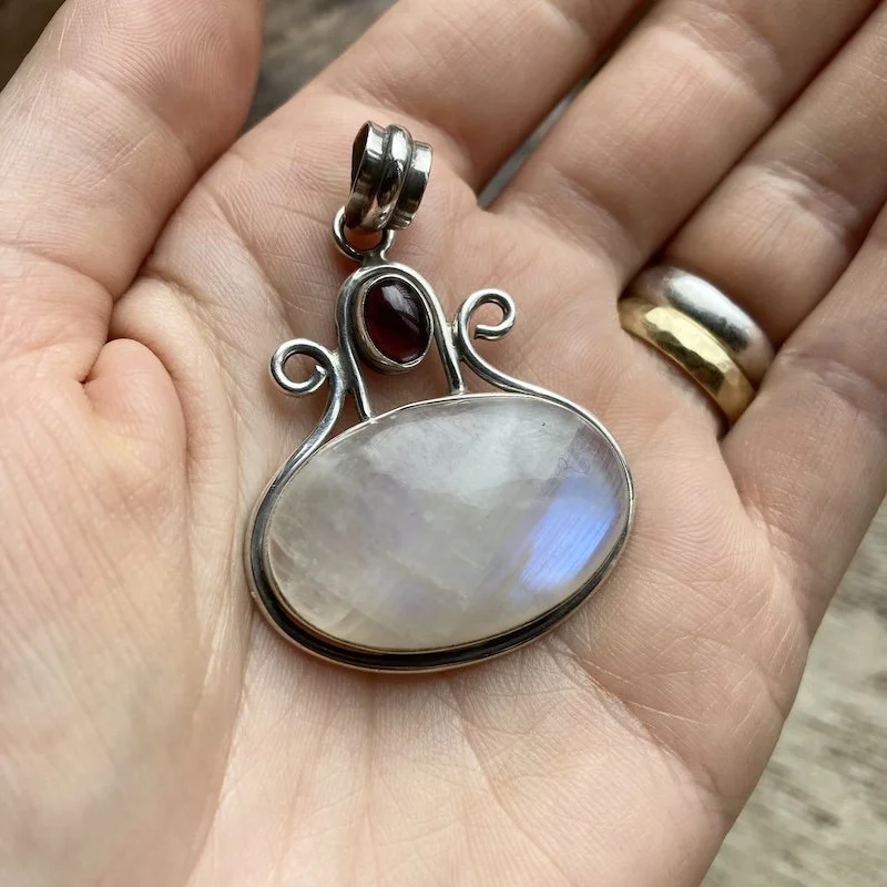 sterling silver rainbow moonstone and garnet pendant 4.jpeg