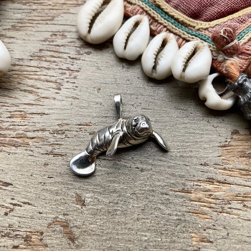 sterling silver manatee pendant.jpeg