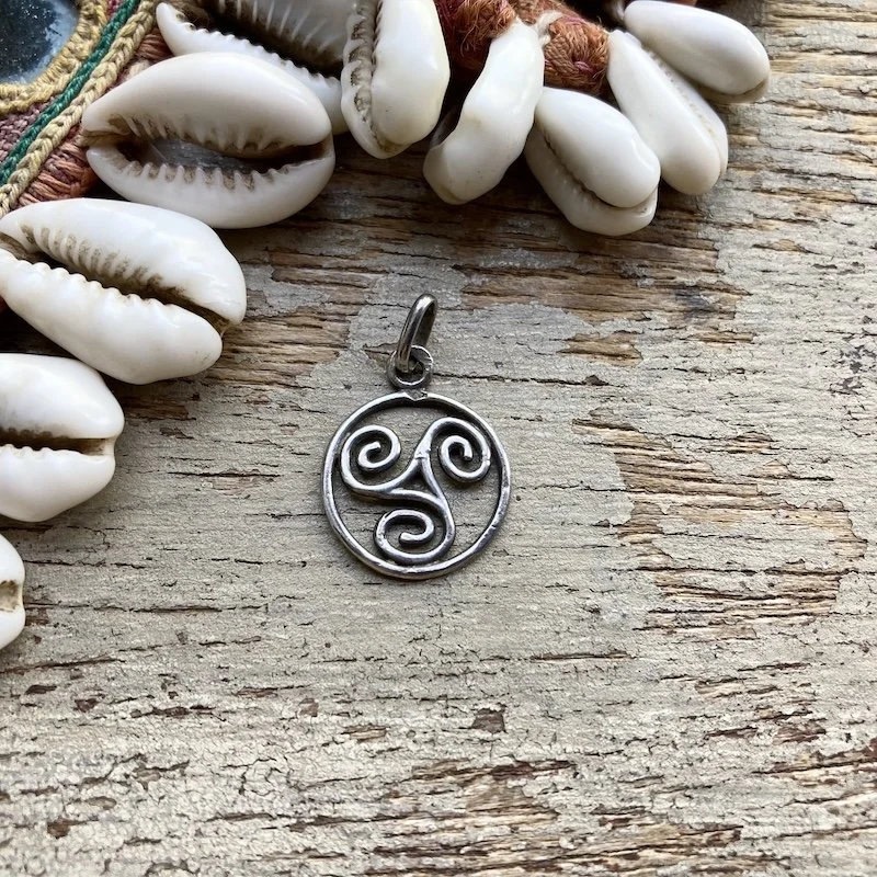 vintage sterling silver triskelion pendant 1.jpeg