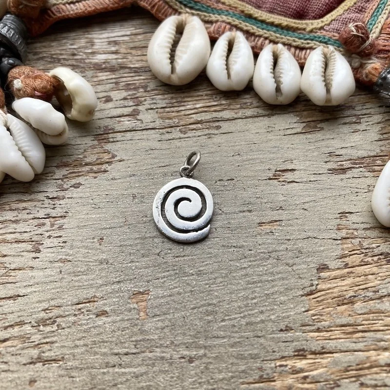 vintage sterling silver spiral pendant.jpeg