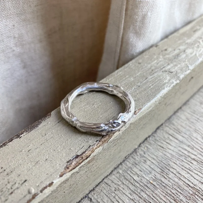 handmade molten textured solid silver ring 2.jpeg