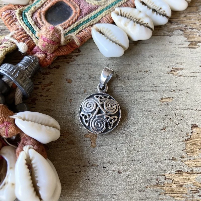 vintage solid silver triskelion pendant 1.jpeg