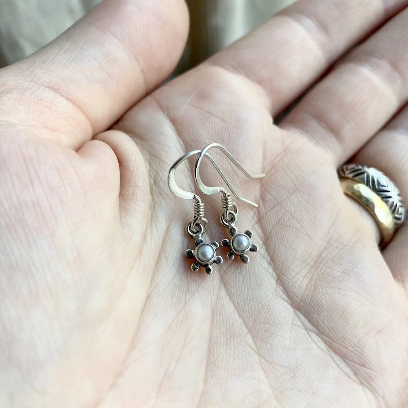 tiny little sterling silver pearly flower earrings 1.jpeg