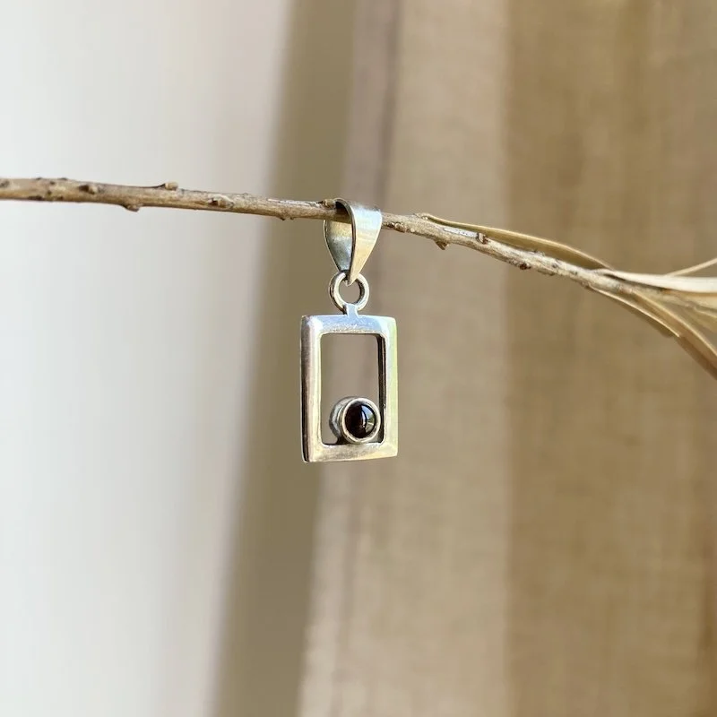 simple sterling silver and garnet pendant 4.jpeg