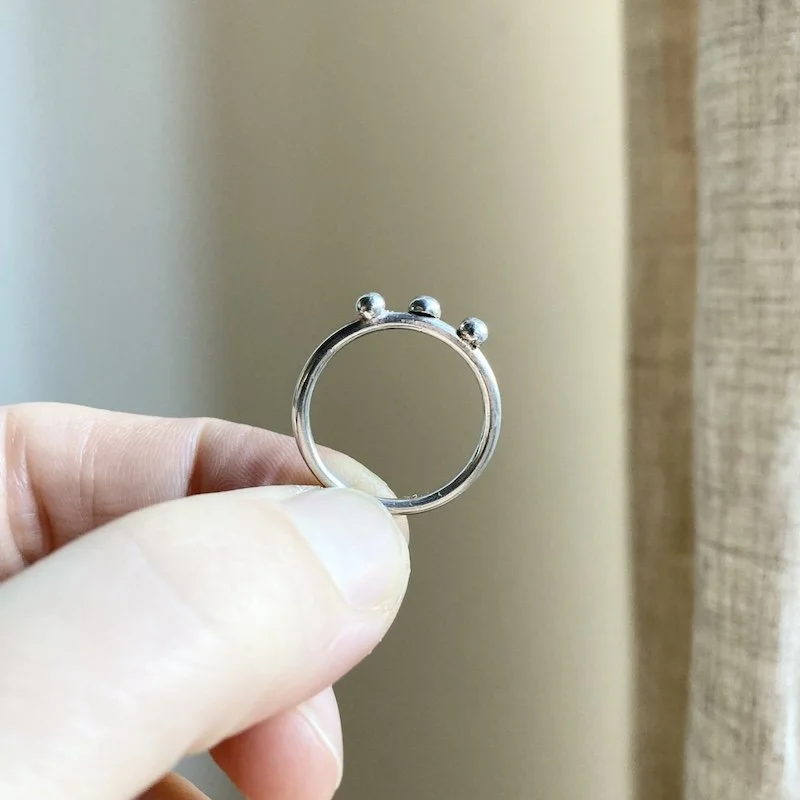simple sterling silver dot band ring. 3.jpeg